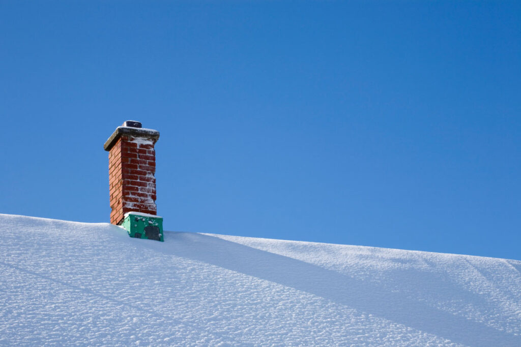 snowy roof - rexburg snow removal services